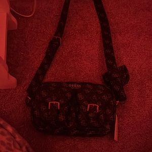 A guess bag, brand new. Still has tags and packaging inside